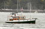 ID 3687 AUCKLAND ANNIVERSARY DAY REGATTA - Tug racing - BONDI BELLE (1898) returns to harbour following the racing. She was used as a log tug in Opua in the Bay of Islands and the Hokianga, New Zealand around...